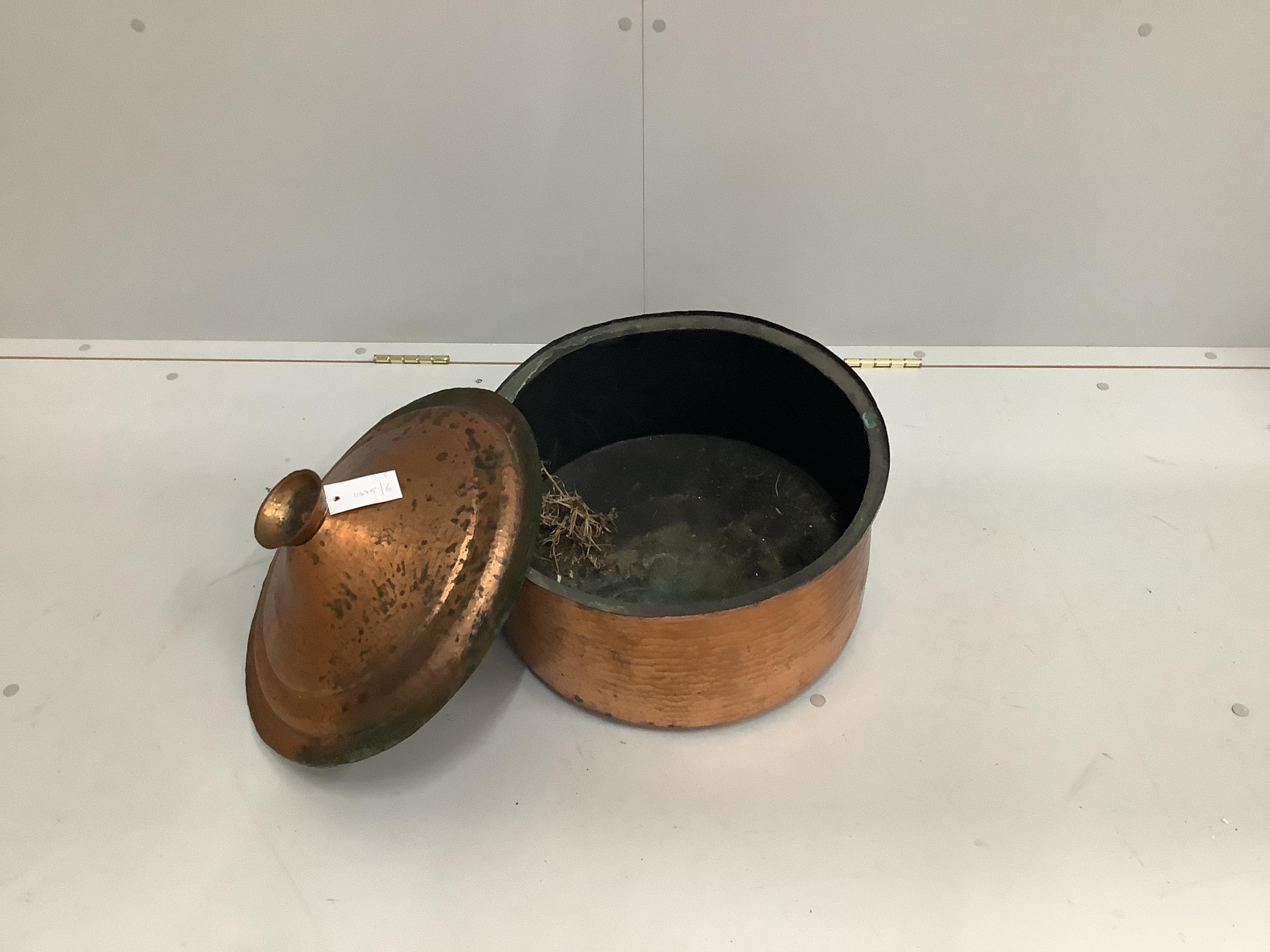 A circular copper lidded cauldron, diameter 44cm, height 36cm